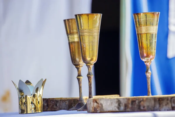 Brass glass standing tall on table under sunny day — Stock Photo, Image