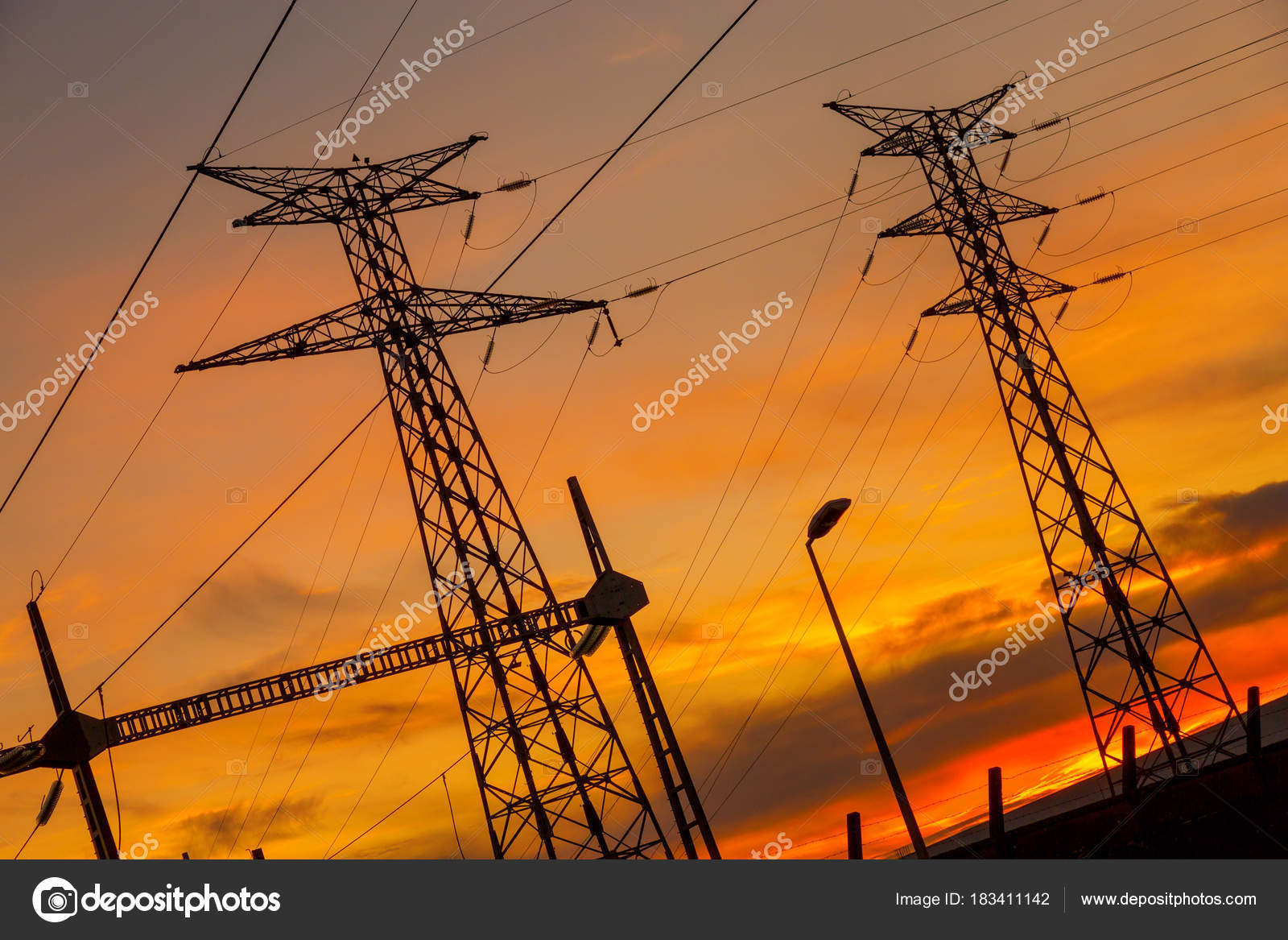 High Voltage Wire Electrical Energy Plant Producing Electricity Sunset