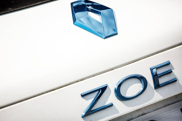 The name and logo on the trunk of the Renault electric car "Zoe"