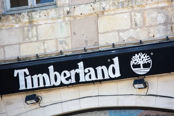 Front store sign of a Timberland clothing and footwear store. — Stock Photo, Image