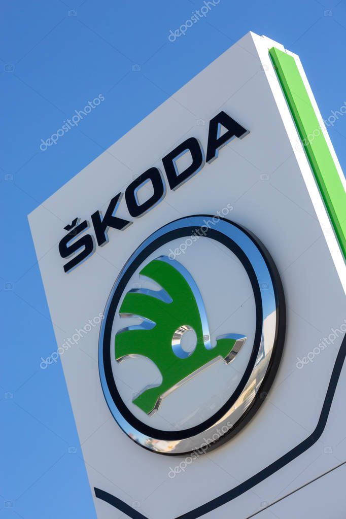 Puilboreau, France - August 7, 2016 : Closeup of Skoda car company logo on white pylon board against clear sky at Puilboreau, France.Skoda is a Czech automobile manufacturer founded in 1895 as Laurin & Kleme
