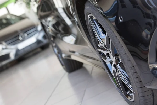 Closeup of black mercedes-benz wheel — Stock Photo, Image