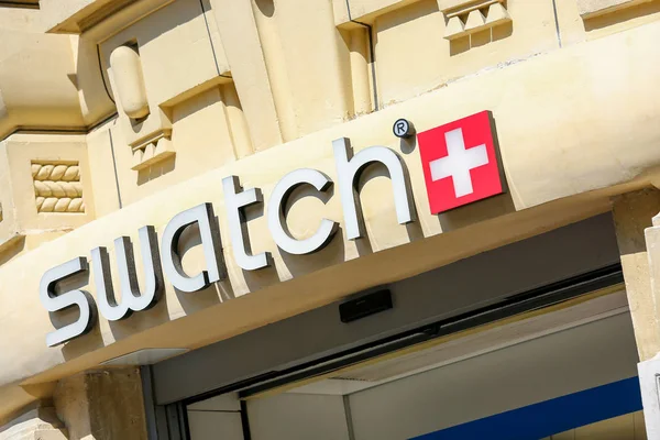 Primer plano de la placa de nombre Swatch fuera de la tienda — Foto de Stock