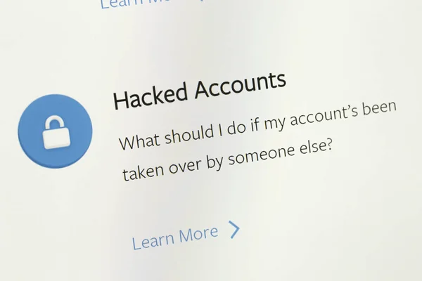 Close up on the FAQ area about Hacked or fished facebook account — стоковое фото