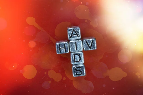 VIH - AIDS disease background concept with cubic metal letters — Stock Photo, Image