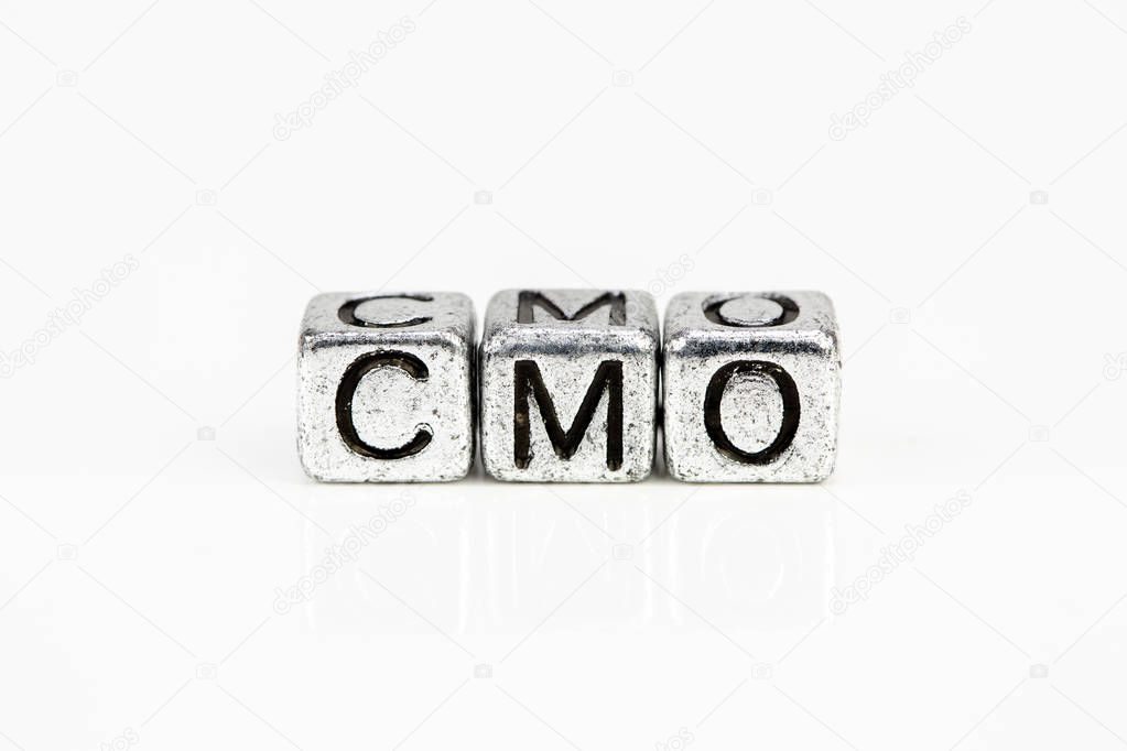 Chief Marketing Officer CMO concept with cubic metal letters