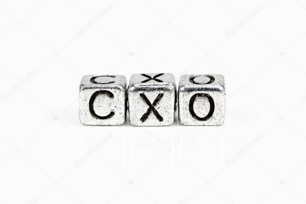 Chief Experience Officer CXO concept with cubic metal letters