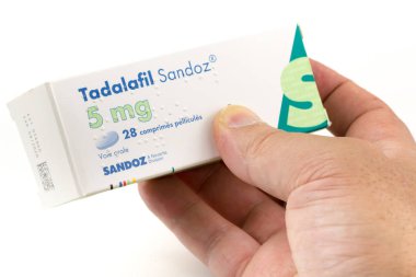 tadalafil 5mg, a medicine used to treat erectile dysfunction or  clipart