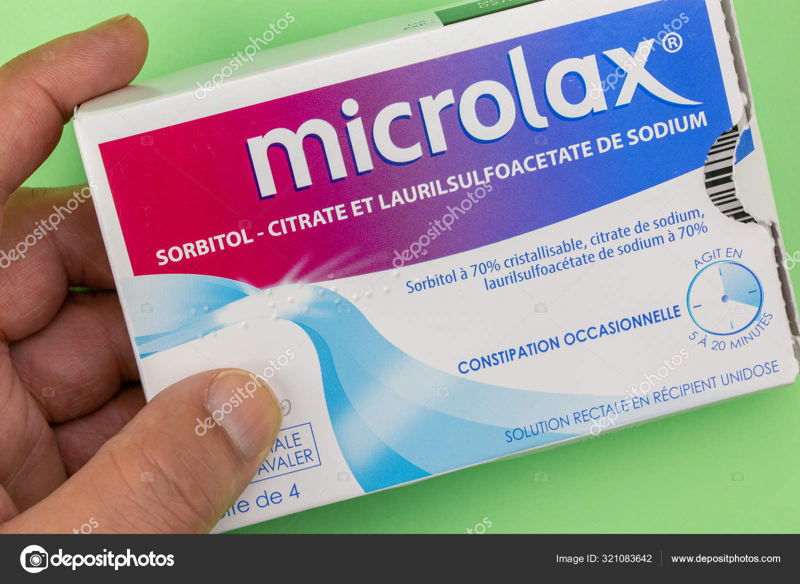 Closeup on Microlax box holding in hand – Stock Editorial Photo © Pixinooo  #321083642