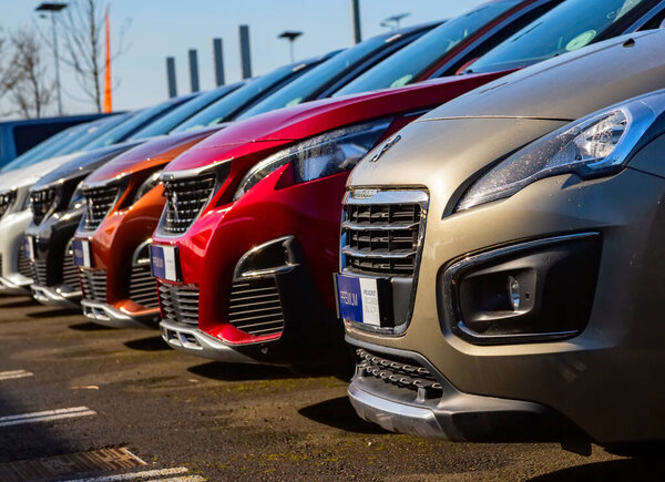 Cognac, France - February 21, 2020:Alignment of luxury second-hand cars for sale on the network of the French Peugeot car dealer