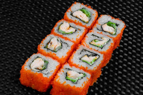 Japanese rolls on a dark textured background — Stock fotografie