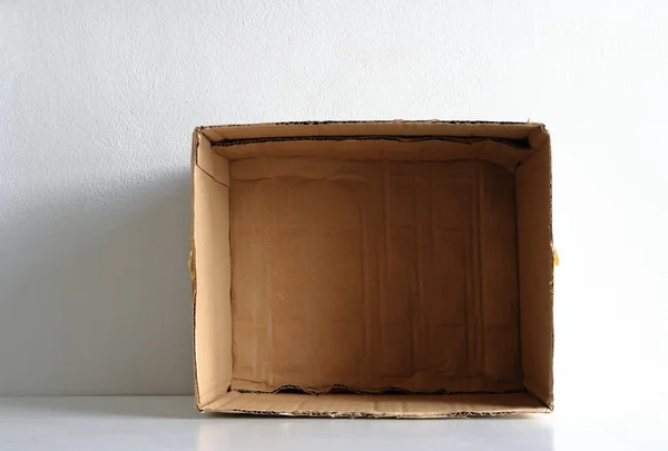 Closeup Selective Focus Bottom Empty Cardboard Box Sunlight Shadow Box — Stock Photo, Image