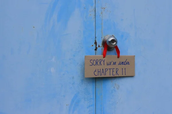 Cardboard Sign Message Sorry Chapter Hanging Doorknob Blue Closed Door — Stock Photo, Image