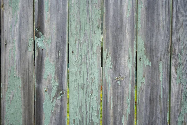 Old wooden fence shabby turquoise paint texture — Stock Photo, Image