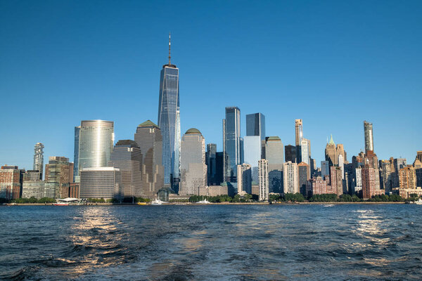 Buildings and skyscrapers of the Manhattan urban skyline over the Hudson river in New York USA