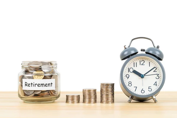 Coin Stack Jar Container Alarm Clock Wooden Desk White Background — Stock Photo, Image