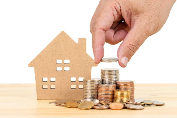 Coin Stack Model House Hand Putting Money Wooden Desk White — Stock Photo, Image