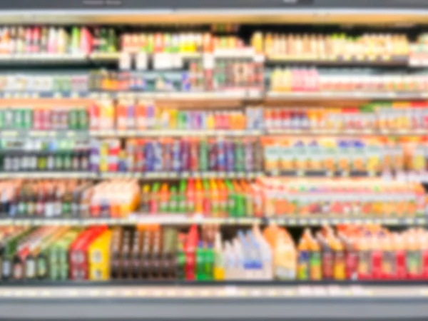 Abstract blurred modern retail supermarket aisle shelves chilled zone