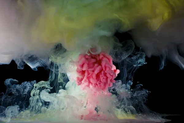 Liquid ink moving in the water and mixed — Stock Photo, Image