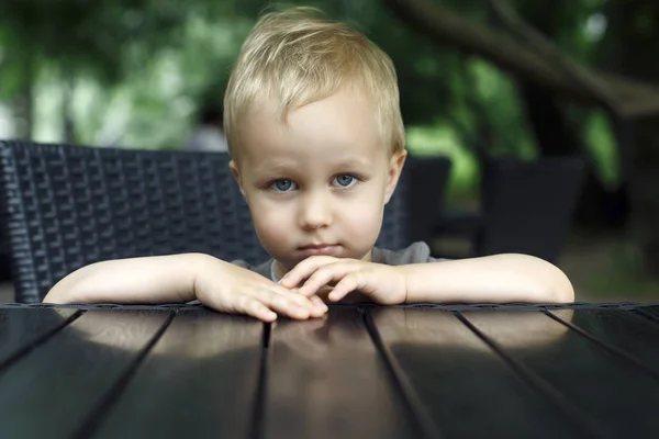 Little boy - serious portrait without a smile