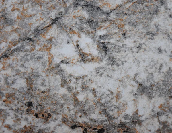 Gray marble, a natural pattern of gray stone with black and orange veins.
