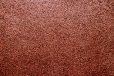 Koyu turuncu yumuşak kaba kumaş arkaplan dokusu yakından hissetti