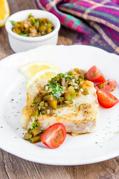 Fried white fish fillet with sauce chutney pickled cucumber — Stock Photo, Image