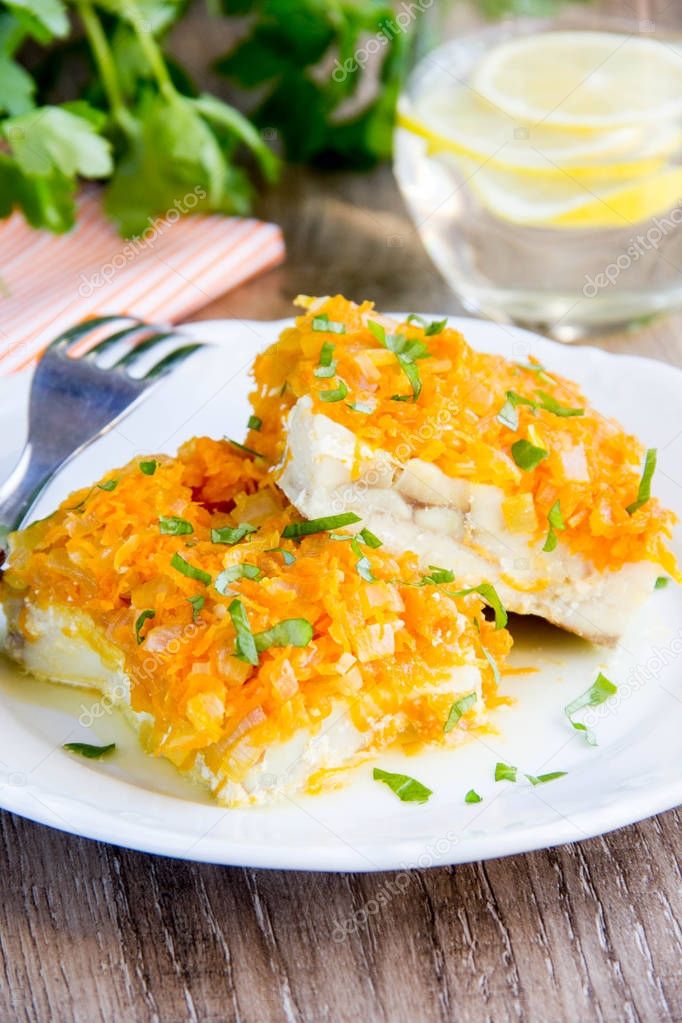 White fish fillet baked with carrots, onions, tasty dish of Russ