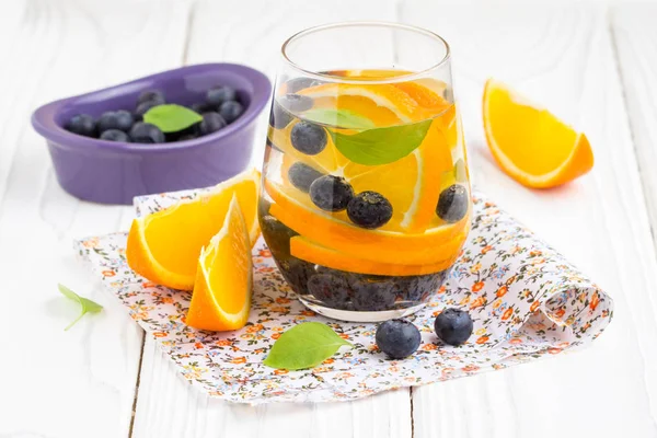 Water with orange and blueberry, summer healthy soft drink — Stock Photo, Image