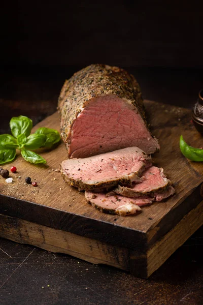 Juicy roast beef with spices sliced on a cutting Board, deliciou ストックフォト