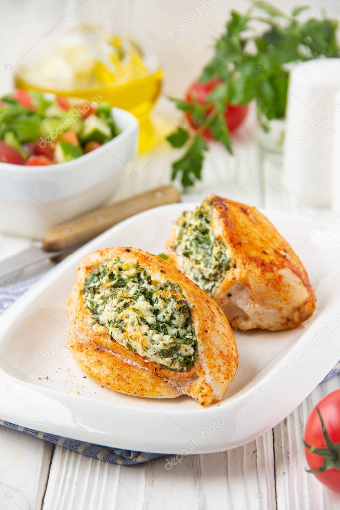 Chicken fillet stuffed with cottage cheese (ricotta, feta) and h