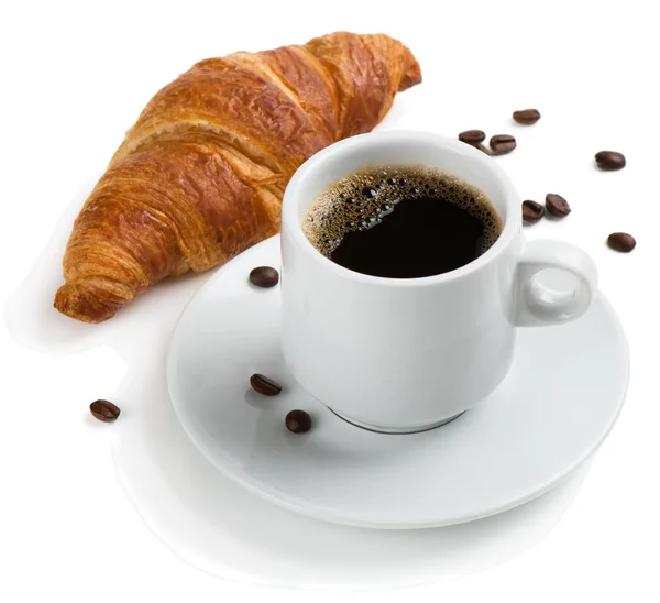 Café negro y croissant. — Foto de Stock