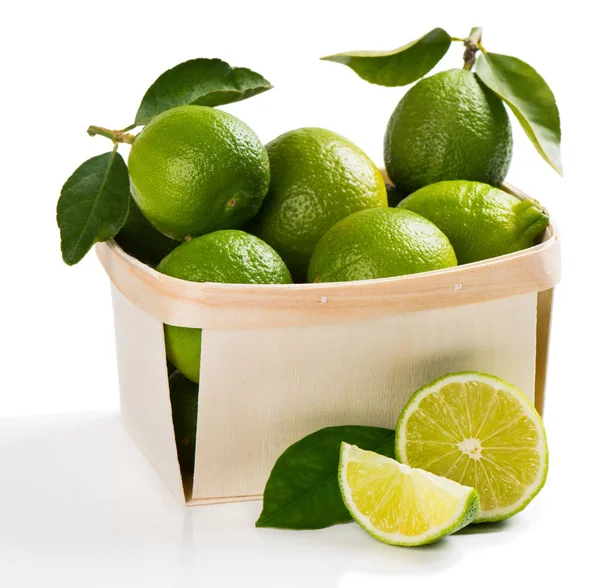 Lime fruits in a box. — Stock Photo, Image