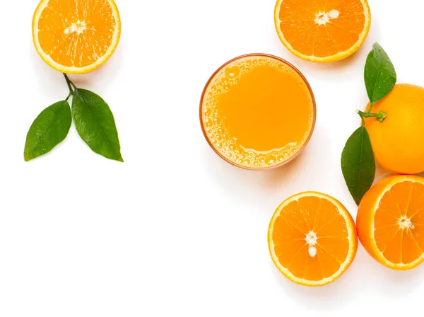 Oranges and juice, above view. — Stock Photo, Image