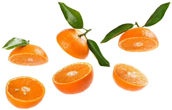 Halves of tangerines in air. — Stock Photo, Image