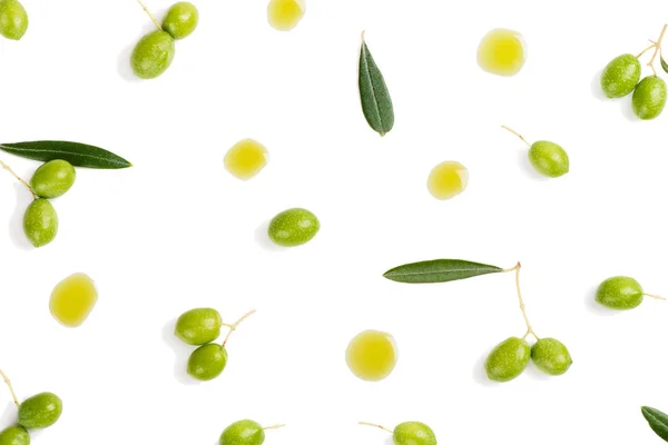 Morsen van olijfolie en olijven, boven weergave. — Stockfoto