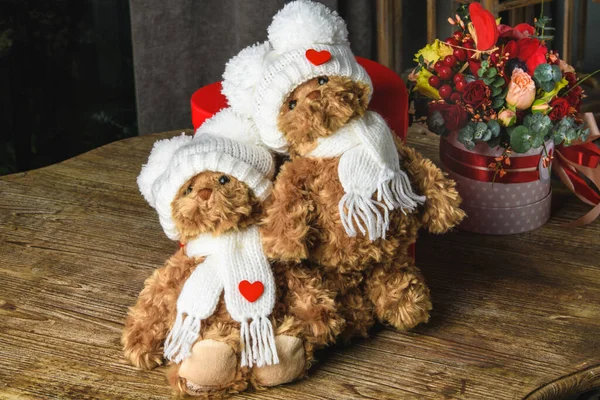 A bouquet of flowers for the holiday romantic gift to the girl teddy bear