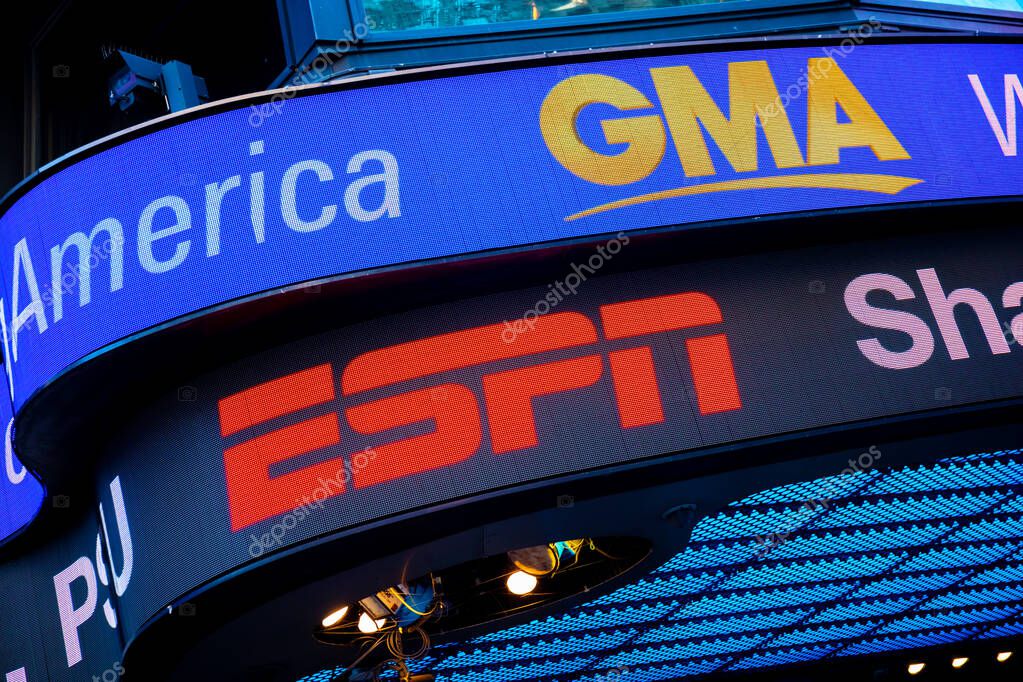 Manhattan, New York, USA - November 6, 2019: ESPN and GMA LED billboard banner above the New York studios in Times Square.