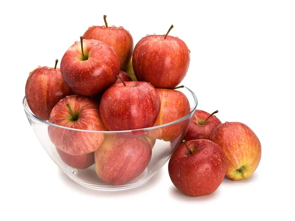 Úrodu červených jablek v skleněná váza — Stock fotografie