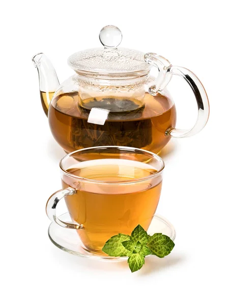 Färsk mynta och grönt te i en kopp och en tekanna från glas — Stockfoto