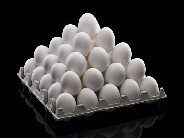 Pyramid from white eggs — Stock Photo, Image