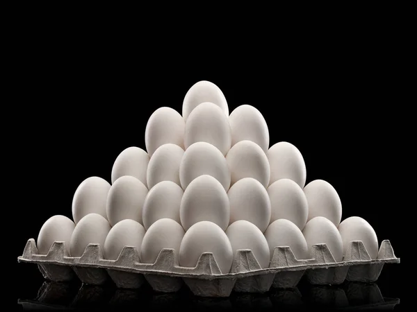 Pyramid from white eggs — Stock Photo, Image