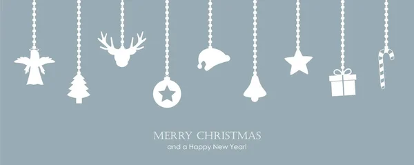 Karlı bir Noel tebrik kartı ve asılı bir süsleme.