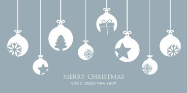 Kar taneleri, yıldızlar ve hediyelerle süslü Noel süslemeleri.