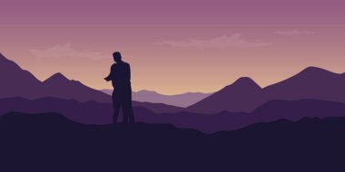young couple enjoy the mountain view at purple landscape