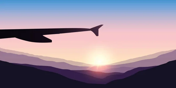 Nascer do sol nas montanhas vista do avião — Vetor de Stock