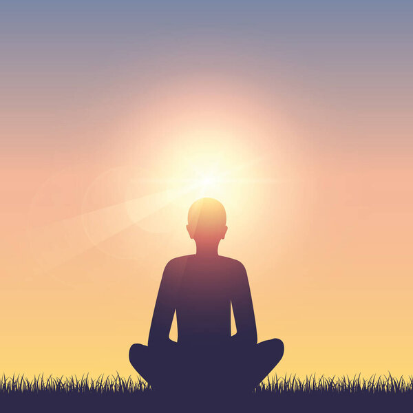 meditating person on summer meadow at sunshine