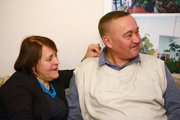 Portrait of senior pair that is sit together.