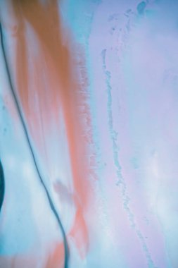 Renkli soyut epoksi reçine resminin makro fotoğrafı. Tasarım kapağı, yıllık rapor, davetiye, el ilanı, sunum, ambalaj, poster, kartvizit, düğün davetiyesi için başvurulabilir. Modern sancak için modern sıvı sanat, ruhani grafik tasarım.