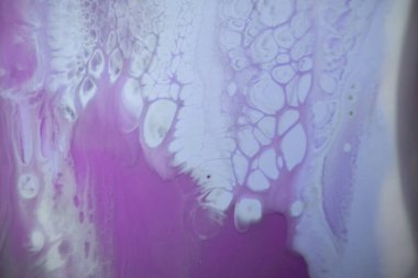 Renkli soyut epoksi reçine resminin makro fotoğrafı. Tasarım kapağı, yıllık rapor, davetiye, el ilanı, sunum, ambalaj, poster, kartvizit, düğün davetiyesi için başvurulabilir. Modern sancak için modern sıvı sanat, ruhani grafik tasarım.